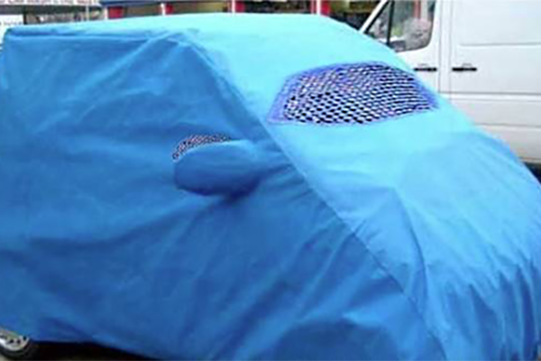 car with a blue cover