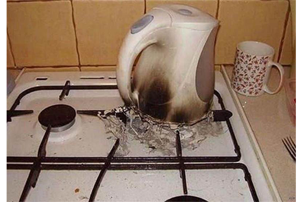 melted coffee pot on stove